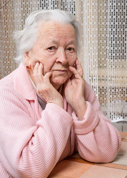 istock Old sad woman 532320819