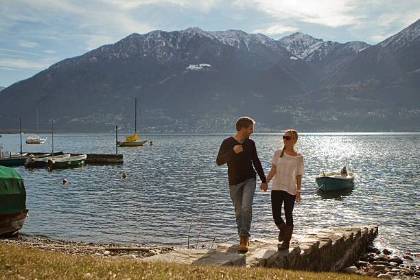 istock Happy couple walking by the lake 532321453
