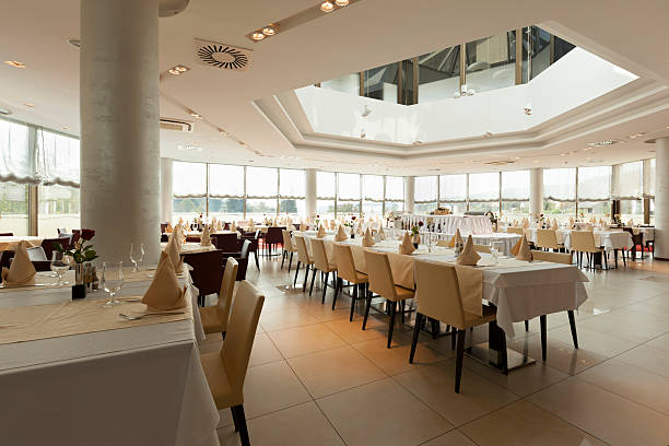 istock Bright restaurant interior with tables arranged for special even 532323087