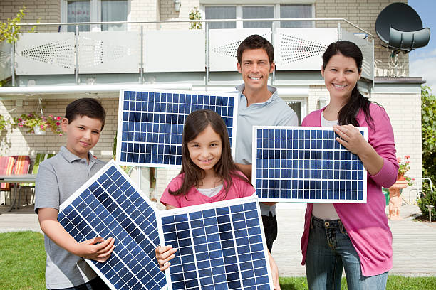 istock Family With Solar Panels 532325790
