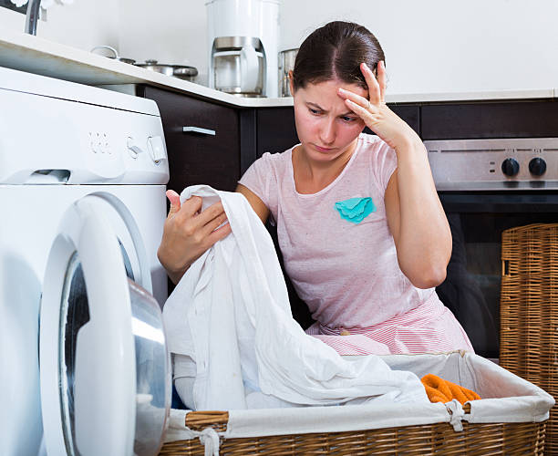 istock Upset housewife cannot wash stains 532326278
