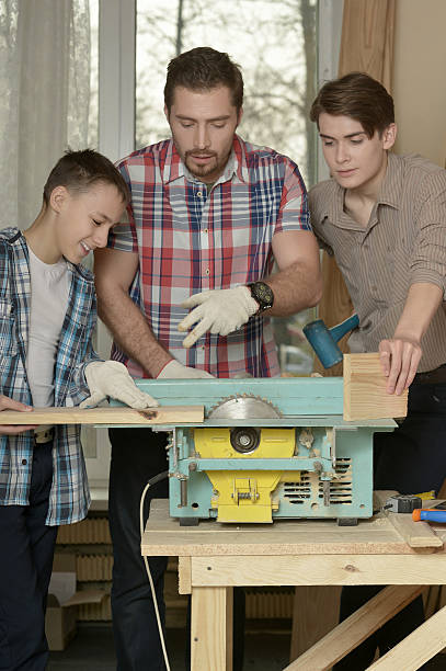 istock men and boy doing repair at home 532327108