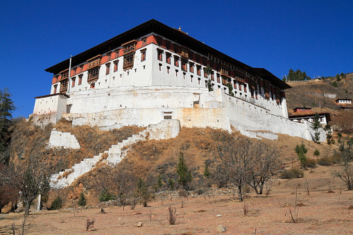 Paro Rinpung Dzong, Buddhist monastery and fortress, on a hill above a river Paro Chu near to the city Paro