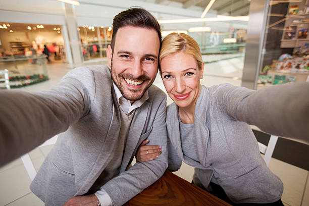 istock Happy young couple taking selfi 532329524