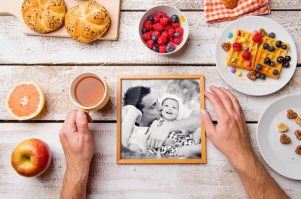 istock Fathers day composition. Black-and-white photo and breakfast mea 532330776