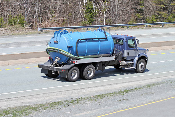 istock Septic Tank Pump Truck Travelling On Highway 532331404