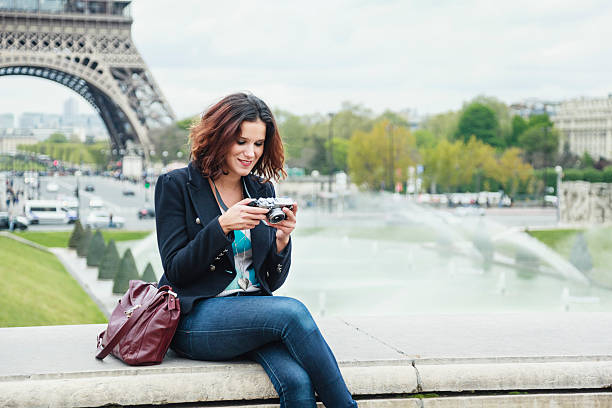istock Tourist with camera in front of Eiffel Tower (Paris ,France) 532333808
