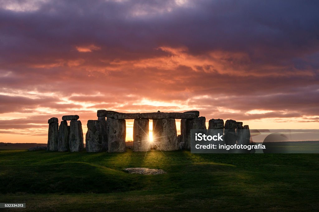 Sunset over Stonehenge Colorful sunset over Stonehenge Stonehenge Stock Photo
