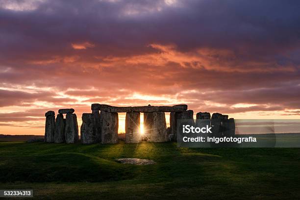 Sunset Over Stonehenge Stock Photo - Download Image Now - Stonehenge, Sun, Sunset
