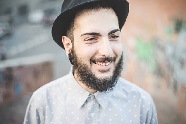 istock young handsome hipster gay modern man 532334655