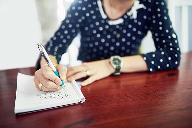 istock Crossing off tasks from her to do list 532334752