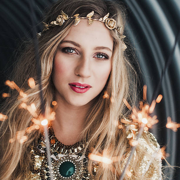 Young beautiful woman outdoors, in contemporary style. With long hair and a beautiful face.