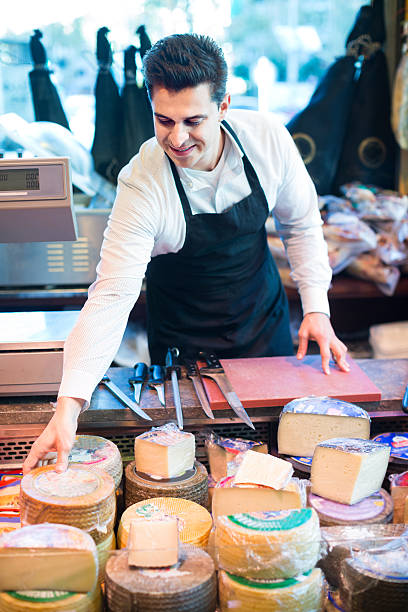 istock salesman with cheese in gastronomy 532335132