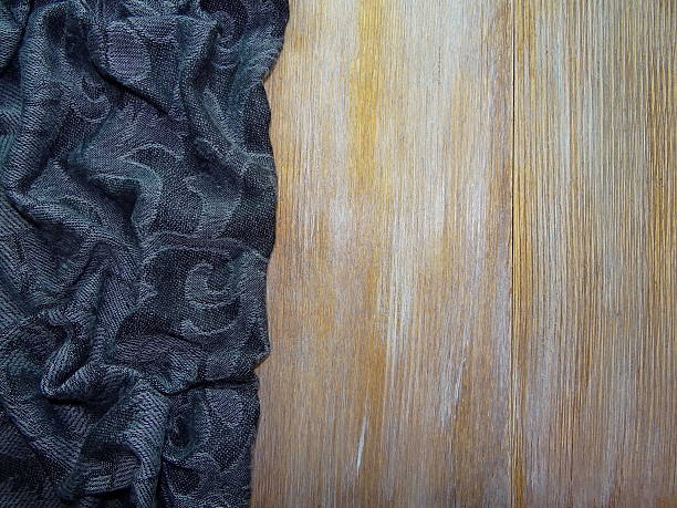 istock black cloth over wooden boards 532335952