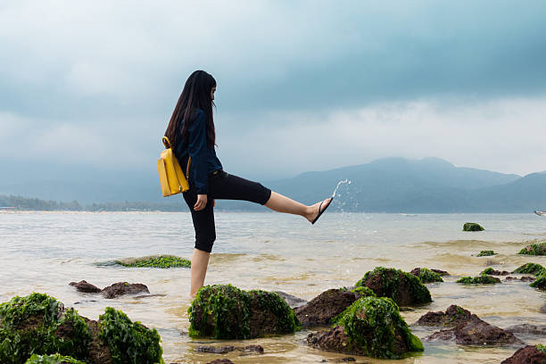 Young Woman At The Beach