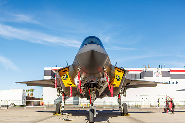 F-35 Lightning II fighter on static display at Nellis AFB Las Vegas, USA - November 9, 2014: F-35 Lightning II fighter on static display at Aviation Nation at Nellis AFB on November 9,2014 in Las Vegas,NV. It is the world's most advanced multi-role fighter. supersonic airplane editorial airplane air vehicle stock pictures, royalty-free photos & images