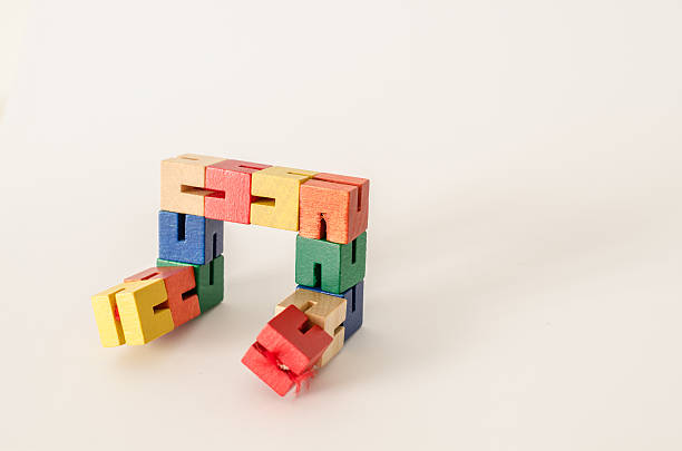 istock Articulated Colored Wooden Puzzle 532338288