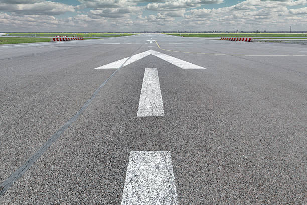 istock Arrow runway airport 532338324
