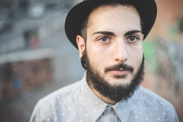 istock young handsome hipster gay modern man 532338739