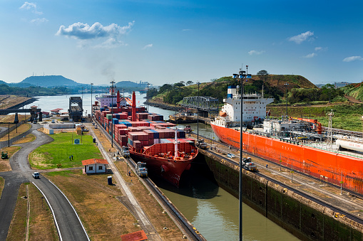 Miraflores Gates, Panama - March 17, 2014: Ships entering the Miraflores gates in the Panama Canal, in Panama.