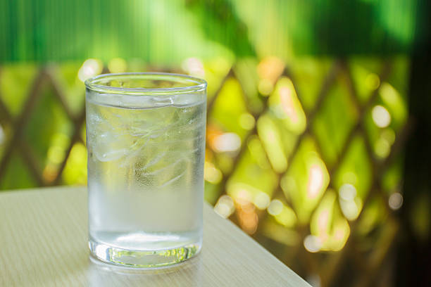 istock glass of water on wood table 532341784