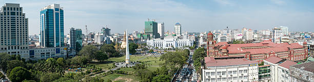 View of Central Yangon Yangon, Myanmar - January 11, 2016: Vandoola Park, High Court and surrounding buildings in Central Yangon, Myanmar. sule pagoda stock pictures, royalty-free photos & images