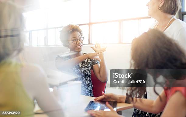 Unposed Group Of Creative Business People In An Open Concept Stock Photo - Download Image Now