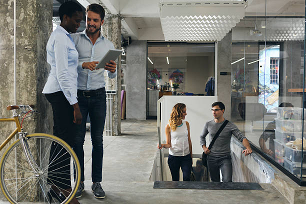 istock Business People Talking In A Office Corridor. 532343654