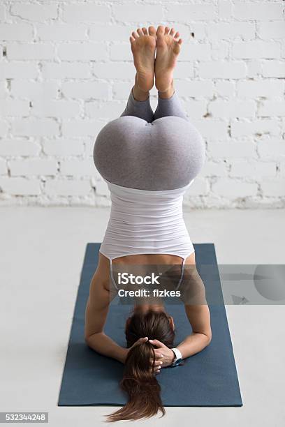 Yoga Indoors Preparation For Salamba Sirsasana Stock Photo - Download Image Now - Yoga, Teenage Girls, Gym