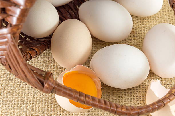 istock Fresh eggs in a wooden basket 532346038