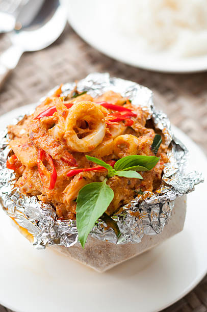 istock Thai food, Steam seafood with curry paste cakes 532346476