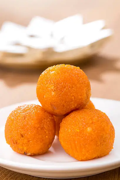Pile of orange Indian sweets Motichoor Laddu or Laddoo