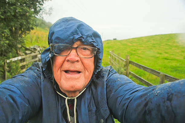 Senior Man on a Rainy Day, Scotland stock photo