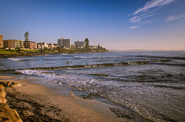 istock Sunrise at rocky beach in urban Australia 532349998