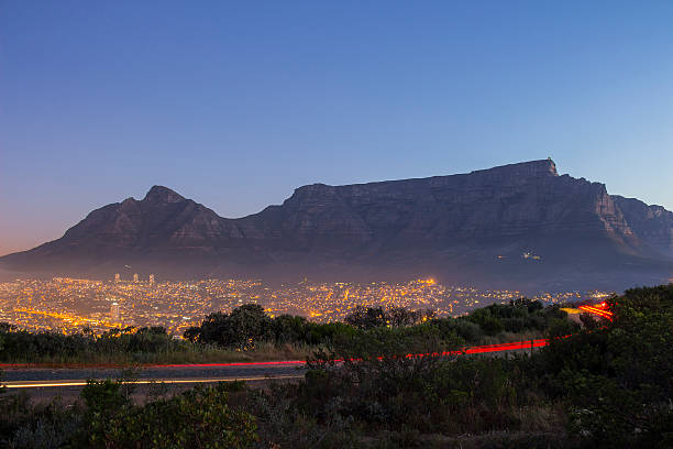 istock Table Mountain at dusk with passing cars 532350677