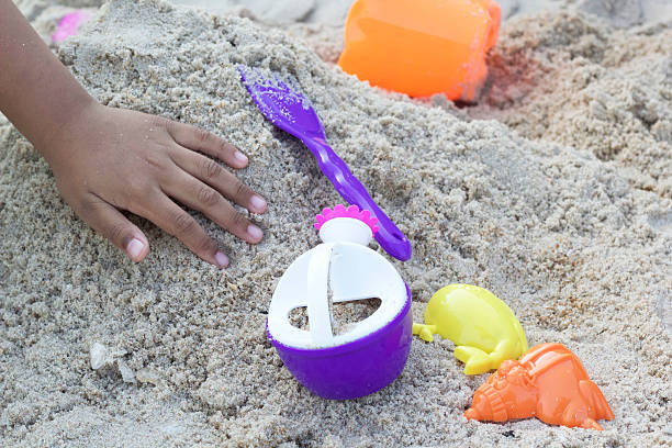 istock Children playing toy on sand 532352075