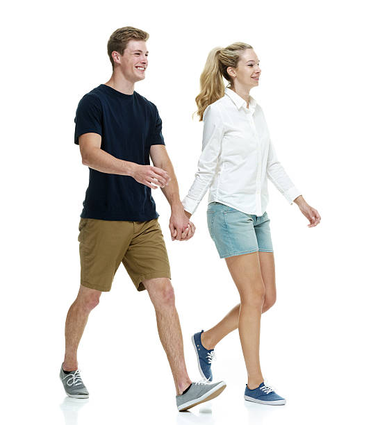 istock Happy couple holding  hands and walking 532352898