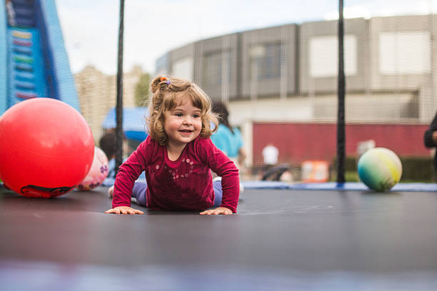 istock Girl having fun on trampoline 532353352