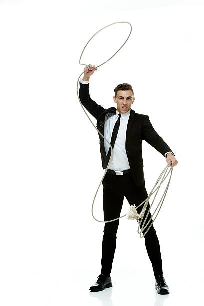 istock Businessman lassoing 532354075