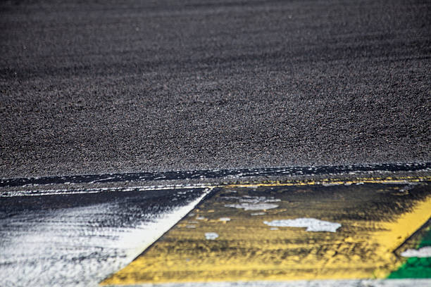 istock Race track corner with yellow and white stripes 532354727