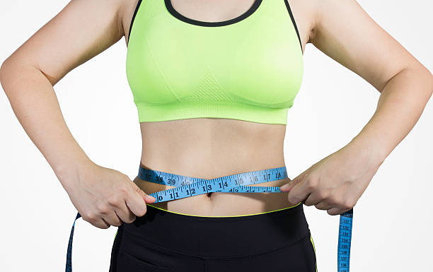 istock body with measuring tape 532355110