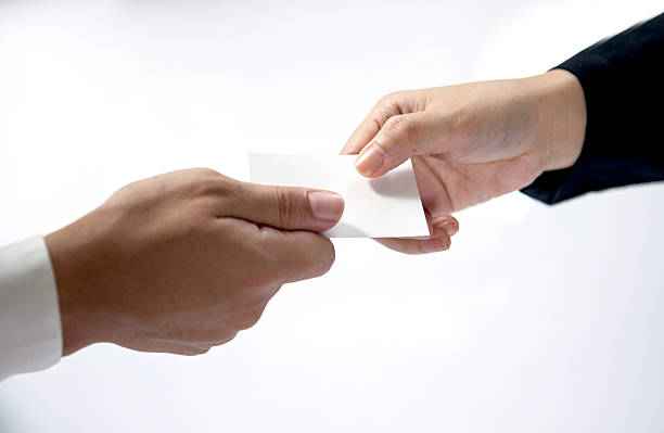 istock business executive exchanging business card 532355486