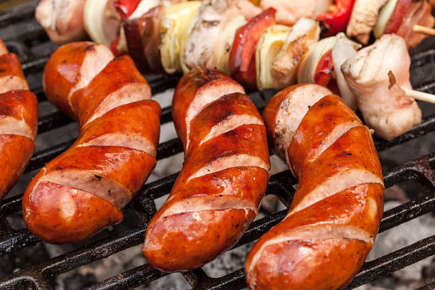 istock Grilling sausages and  shashlik. 532356880