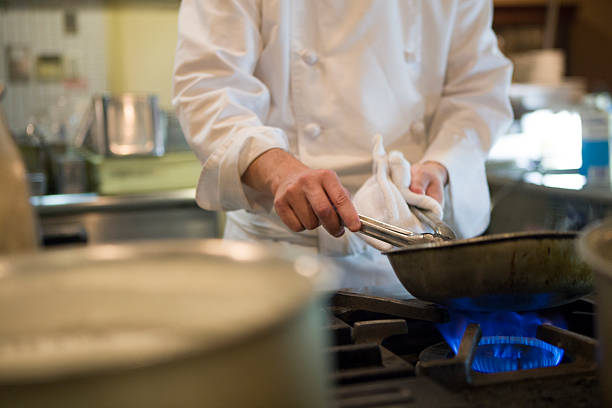 istock Chef is cooking in the Italian restaurant kitchen 532357033