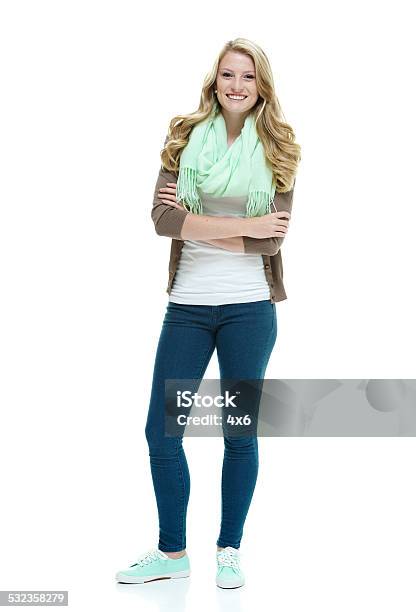 Happy Casual Woman Looking At Camera Stock Photo - Download Image Now - Arms Crossed, Full Length, Standing