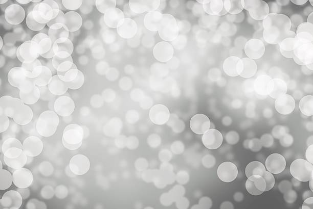 istock chrismas silver background with bright sparkles and lights of snow 532358371