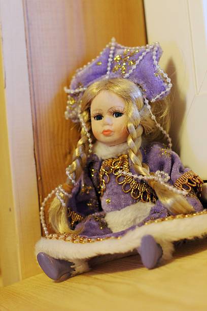 Doll  in Christmas style headdress with blond hair