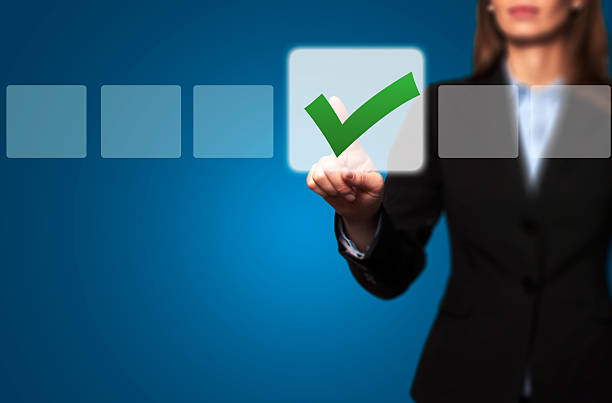 istock Businesswoman Touching Button and Ticking Check Box 532372829