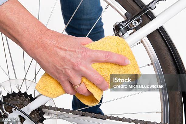 Spring Cleaning Of The Bike Frame With A Cloth Stock Photo - Download Image Now - Cleaning, Bicycle, Cycling