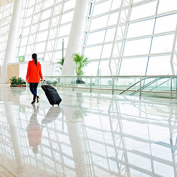 istock woman at airport 532376581
